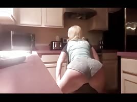 Sexy blonde girl shaking her huge ass